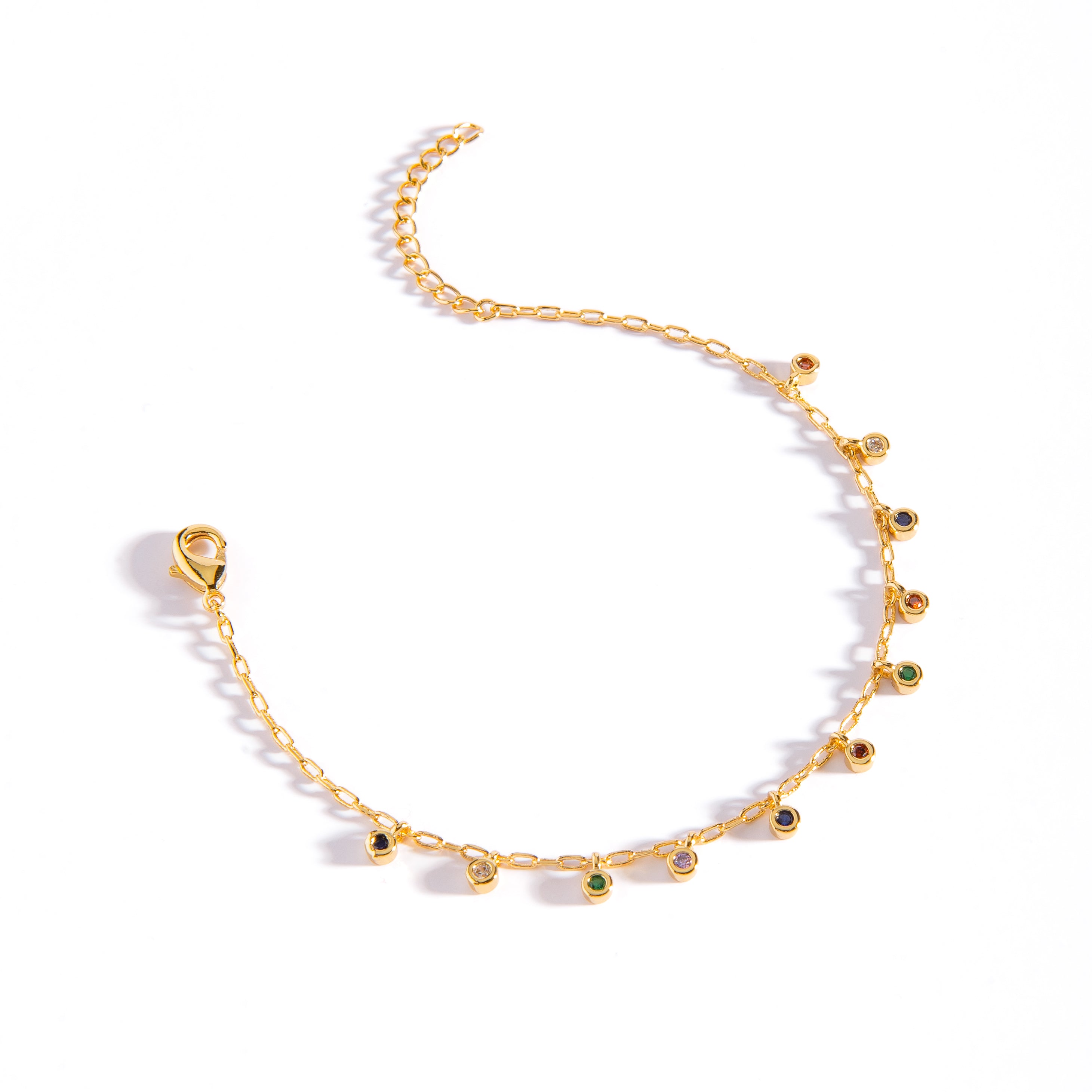 PULSERA EN ORO CON CHARMS DE GOTAS COLGANTES