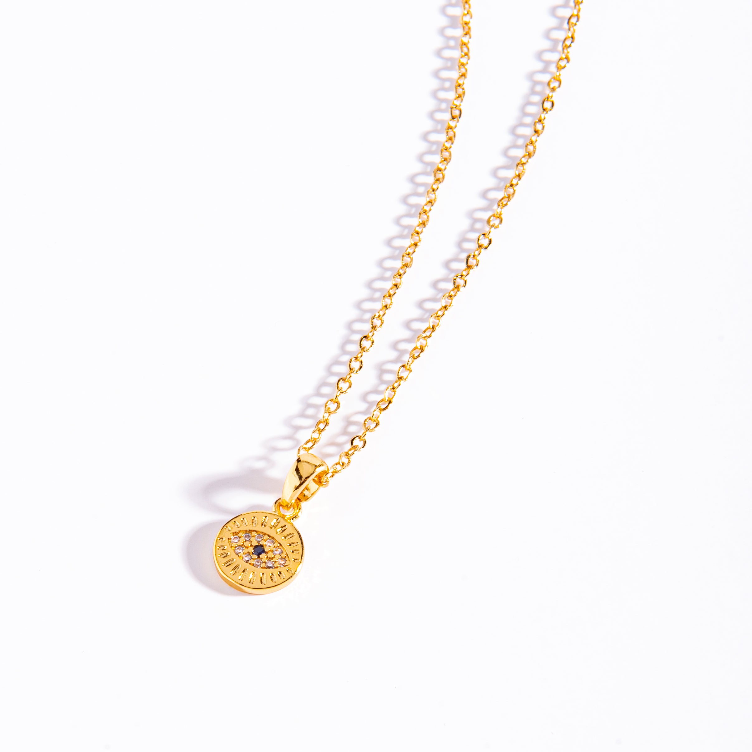 COLLAR CON DIJE EN CIRCULO OJO TURCO